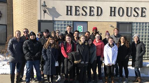 A group of students outside Hesed House homeless shelter.