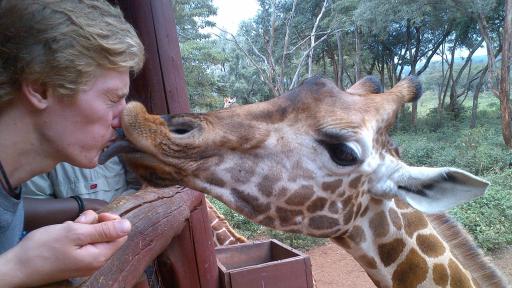 student with giraffe 