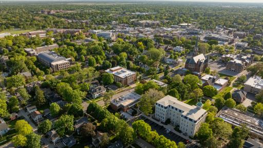 A drone still of campus on a sunny day.