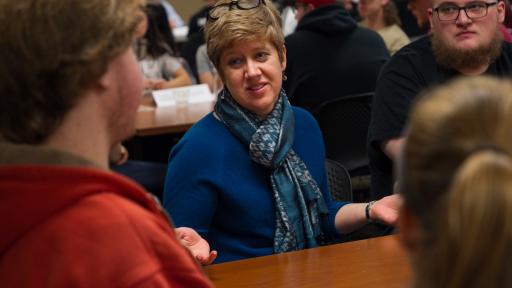 Dean Lisa Long gives out advice to students at a Cardinal First Sophomore Supper.